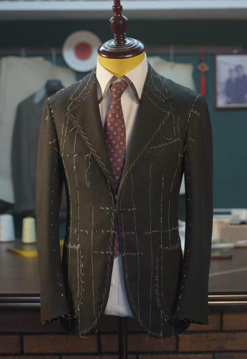 Blazer on mannequin during the design phase with chalk markings