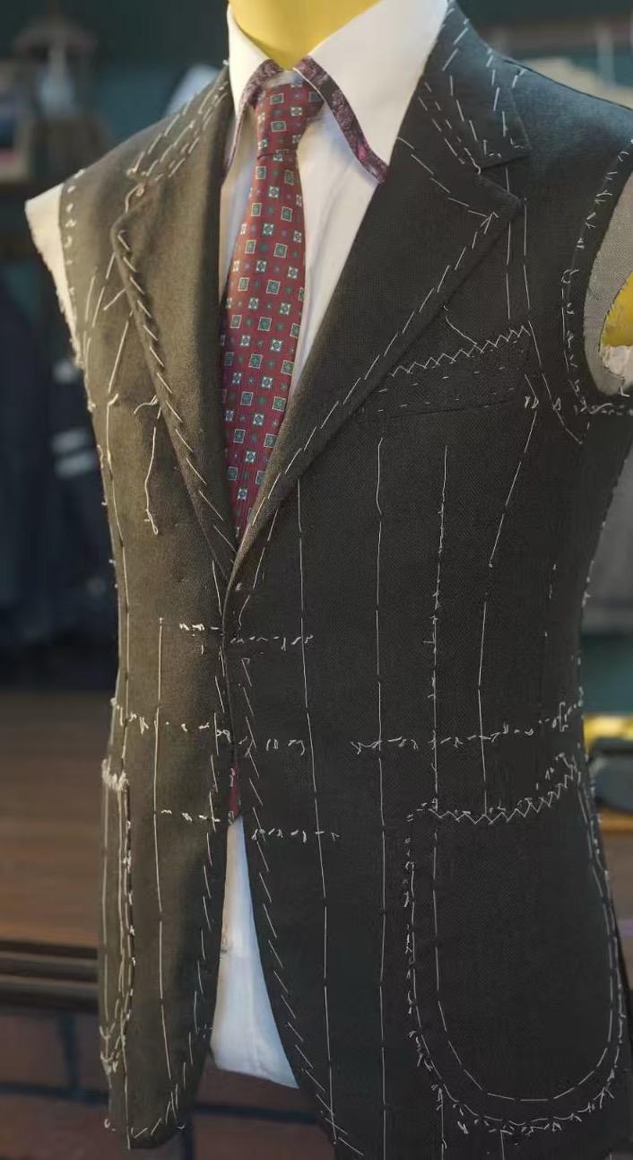 Suit top being developed with visible construction details